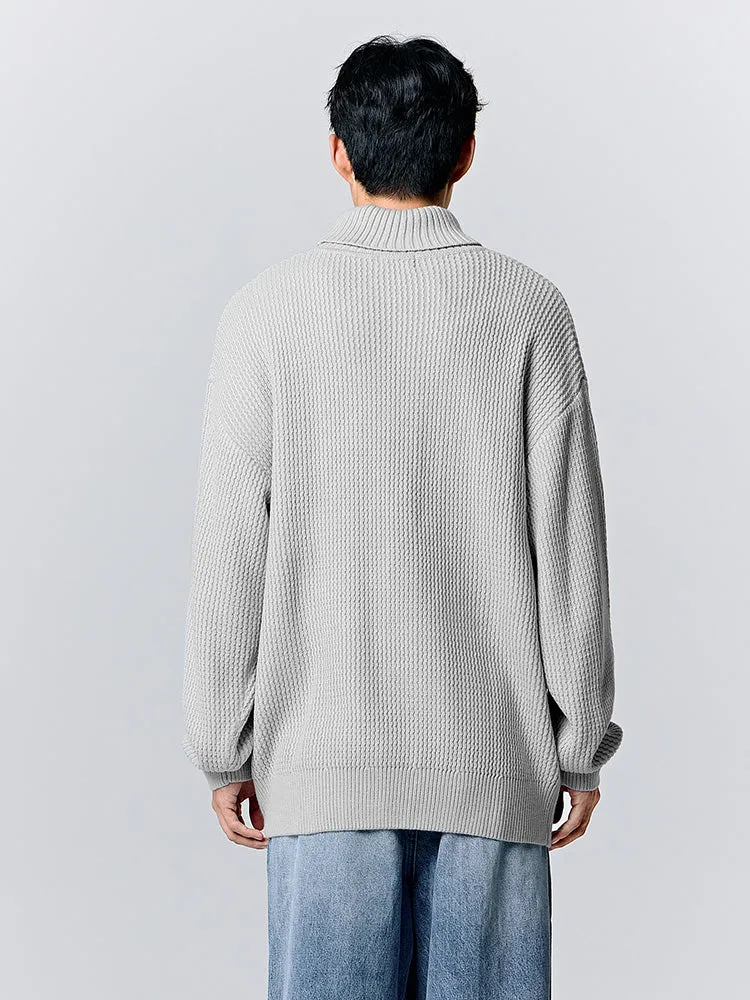Men's cream turtleneck sweater
