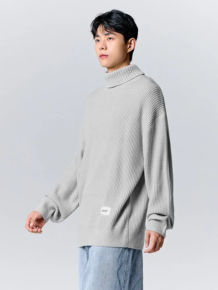 Men's cream turtleneck sweater