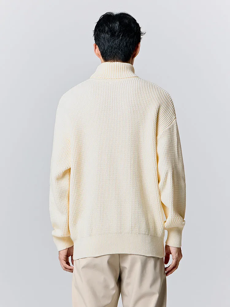Men's cream turtleneck sweater